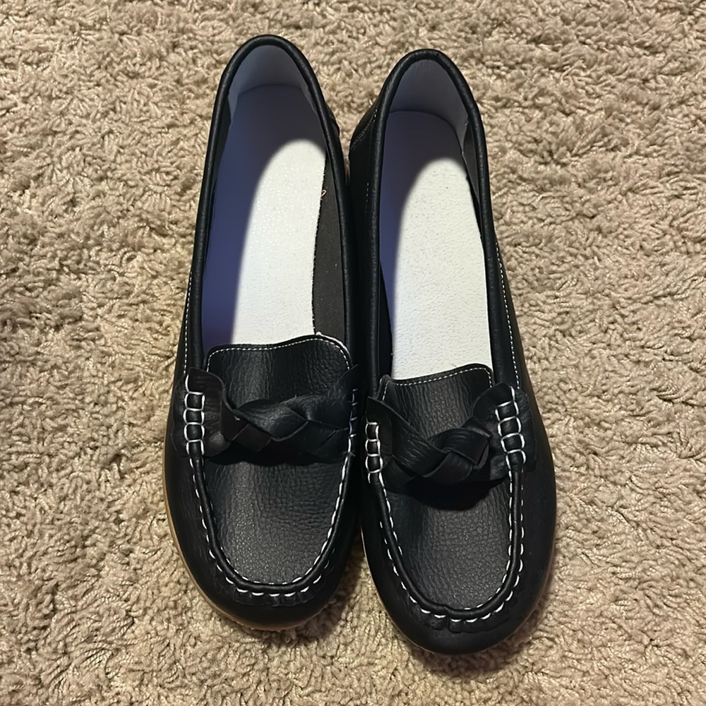 Solsagn, NEW , black slip ons , Women’s size 9.5